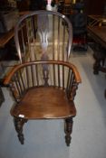 A traditional oak windsor armchair