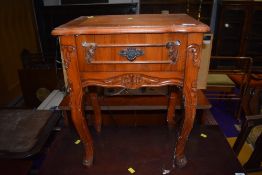 a continental style side table with internal drawer