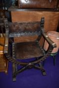A savonarola style chair with oak frame and leather webbing ( Game of Thrones )