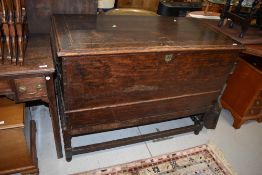 A period oak bedding chest on legs, with later restorations, width approx 120cm