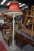 A traditional painted standard lamp