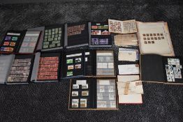 A GB Stamp collection, Victoria to Elizabeth II in albums and folders, along with early covers,