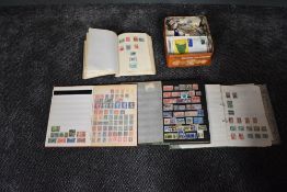 A collection of World Stamps in albums and loose, mint and used