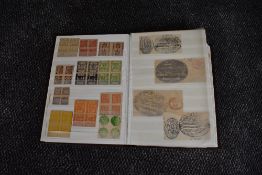 A 64 page stock book containing Fiscal and Cinderella World Stamps, Queen Victoria onwards including