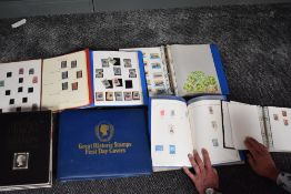 Six albums of mainly used World Stamps along with an empty Great Historic Stamps First Day Cover