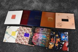 Nine Royal Mail Post Office Year Books, 1984 to 1992, with slip cases and stamps