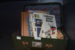 A selection of stamp and philatelic related ephemera including vintage carry case