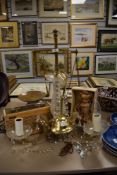 A large set of brass apothecary or chemists scales on mahogany stand, a glass chandelier and a