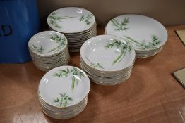 A large collection of vintage Noritake plates of varying size, including dinner plates and two sizes