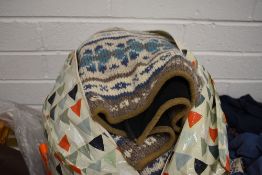 A large bag full of ladies chunky knit wear in larger sizes, some good brands and quality items