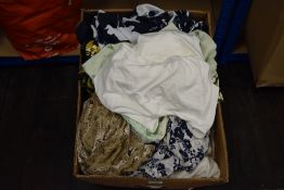 A box full of ladies shirts and tops in different styles, some good brands and quality items amongst