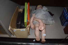 A small lot of vintage toys, including doll,xylophone and a box of train track.