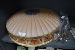 An impressive hand decorated peach light shade fly catcher with original gallery fitments