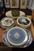 A selection of vintage plates, including two blue and white platters, Wedgwood,collectors plates and