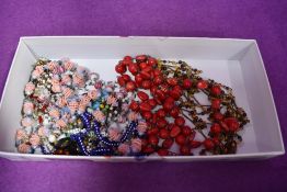A box of costume jewellery beads including glass and vintage