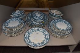 A large amount of late 1880s blue and white transfer pattern with gilt edging dinner service, K