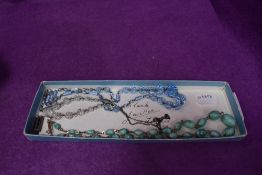 Three vintage crystal bead necklaces and a white metal pendant and chain stamped 925