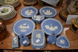 A large quantity of Wedgewood, including christmas plates, trinket dishes and vases, around fourteen