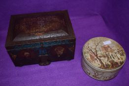 Two collectable biscuit tins, one being Huntley and Palmer having christmas scene, the other Co-