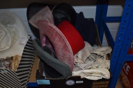 A selection of vintage crotchet work and table linen, and an assortment of hats in different