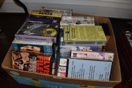 A large box of Elvis VHS videos, some rare and interesting titles