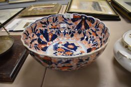 A Japanese export fruit bowl having hand painted design in the Imari palette.