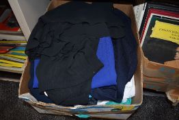 A large lot of ladies clothing, including jeans skirts and trousers.