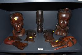 A selection of African tribal hand carved heads and masks including Maasai style heads