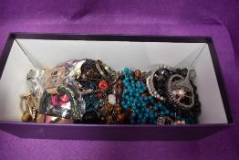A selection of costume jewellery necklaces etc