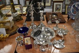 A variety of vintage fine plated wares including bon bon dishes, cruet, and candlestick holders,