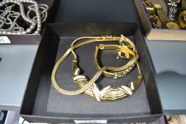 A small selection of 1980's gold plated jewellery by Monet including collarettes, bracelet and