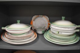 A selection of Art Deco design ceramic serving and dinner plates by Shelley including lidded tureen
