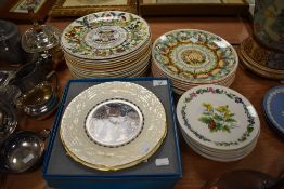 A large quantity of Wedgewood calendar plates and similar display plates, also an engraved Caithness