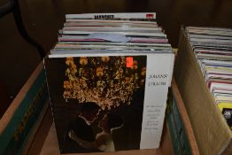 An assortment of vinyl LP records, predominantly classical.