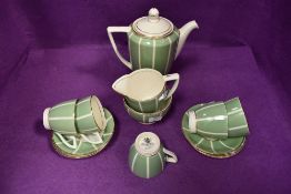 A part Mintons Solano ware coffee set designed by John Wadsworth comprising of five cups , six