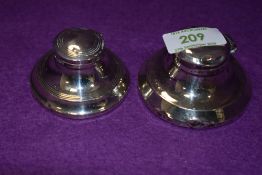 Two HM silver capstan inkwells of traditional form, both lids are loose