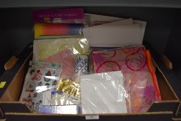 A selection of craft and decoupage materials and papers