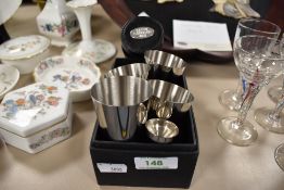 A portable set of metal drink vessels in case engraved with C.S.V.V.S Flookburgh 2010