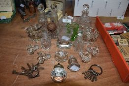 A collection of vintage and antique glass including bottle stoppers, perfume bottles and trinket