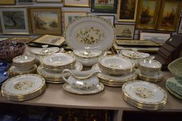 A large quantity of Royal Doulton 'Mandalay' dinner service including tureens, platters, plates,