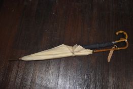 Two vintage umbrellas,both in good condition.