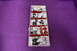 A selection of costume jewellery earrings including enamelled, diamante, murano glass etc