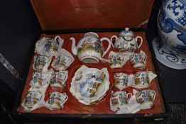 A Chinese export egg shell tea service having hand painted decoration and original case