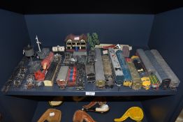 A selection of toy trains and similar model layout accessories