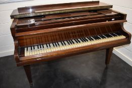 An early 20th Century baby grand piano, 85 key , in mahogany case on square tapered legs, signed