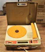 A Fisher Price portable stereo.