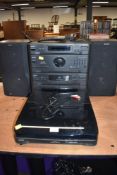 A Philips 540 stackable stereo cassette cd radio and vinyl player with speakers