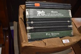 An early 20th Century German button Accordion , possibly original box