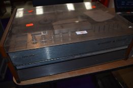 A reel to reel four track tape recorder by Philips