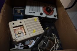 A selection of various design transistor radios including philips and Hacker